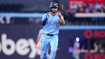 TORONTO, ON - MARCH 31: Andres Gimenez #0 of the Toronto Blue Jays celebrates his home run against the Washington Nationals during the second inning in their MLB game at the Rogers Centre on March 31, 2025 in Toronto, Ontario, Canada. Mark Blinch/Getty Images/AFP (Photo by MARK BLINCH / GETTY IMAGES NORTH AMERICA / Getty Images via AFP)