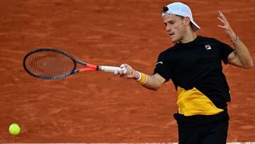 Argentina&#039;s Diego Schwartzman returns the ball to Spain&#039;s Rafael Nadal during their men&#039;s singles semi-final tennis match on Day 13 of The Roland Garros 2020 French Open tennis tournament in Paris on October 9, 2020. (Photo by MARTIN BUREAU / AFP)