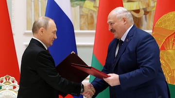 Russia's President Vladimir Putin and Belarus' President Alexander Lukashenko take part in a signing ceremony following a meeting of the Supreme State Council of the Union State of Russia and Belarus in Minsk, Belarus December 6, 2024. Sputnik/Gavriil Grigorov/Pool via REUTERS ATTENTION EDITORS - THIS IMAGE WAS PROVIDED BY A THIRD PARTY.