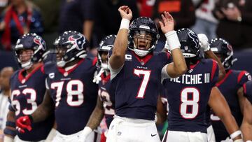 HOUSTON, TEXAS - JANUARY 13: C.J. Stroud #7 of the Houston Texans celebrates a touchdown against the Cleveland Browns during the first quarter in the AFC Wild Card Playoffs at NRG Stadium on January 13, 2024 in Houston, Texas.   Tim Warner/Getty Images/AFP (Photo by Tim Warner / GETTY IMAGES NORTH AMERICA / Getty Images via AFP)