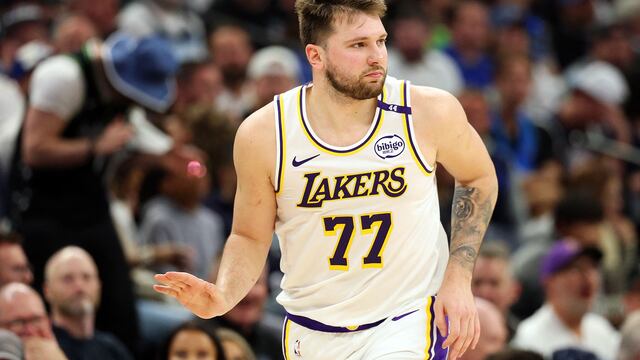 MINNEAPOLIS, MINNESOTA - APRIL 27: Luka Doncic #77 of the Los Angeles Lakers reacts to his three-point basket against the Minnesota Timberwolves in the second quarter of Game Four of the First Round of the 2025 NBA Playoffs at Target Center on April 27, 2025 in Minneapolis, Minnesota. NOTE TO USER: User expressly acknowledges and agrees that, by downloading and or using this photograph, User is consenting to the terms and conditions of the Getty Images License Agreement. David Berding/Getty Images/AFP (Photo by David Berding / GETTY IMAGES NORTH AMERICA / Getty Images via AFP)