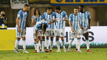 Álex Calvo, el segundo arriba de izquierda a derecha con el pelo largo.