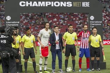 Captains for the day Rabiot and Juanfran exchange pennants before kick-off.