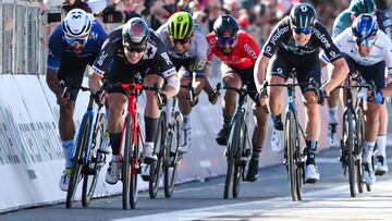 Team Tudor Dutch rider Arvid De Kleijn (2ndL) sprints on his way to win, ahead of Movistar Team Colombian rider Fernando Gaviria (L) and Team DSM Dutch rider Casper van Uden (R) the Milan�Turin semi classic single day cycling race, between the northern Italian cities of Milan and Turin, on March 15, 2023. (Photo by Marco BERTORELLO / AFP)