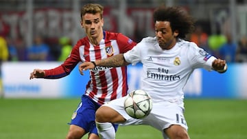 Griezmann y Marcelo. 