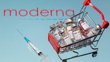 A small shopping basket filled with vials labeled "COVID-19 - Coronavirus Vaccine" and a medical sryinge are placed on a Moderna logo in this illustration taken November 29, 2020. Picture taken November 29, 2020. REUTERS/Dado Ruvic/Ilustration