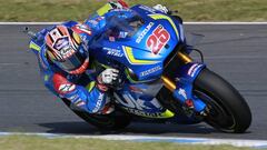 Spain's rider Maverick Vinales steers his Suzuki during a free practice session for the MotoGP Japanese Motorcycle Grand Prix at the Twin Ring Motegi circuit in Motegi, north of Tokyo, Friday, Oct. 14, 2016. (AP Photo/Shizuo Kambayashi)