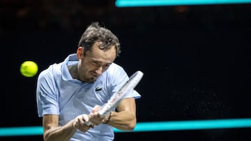 Russia's Daniil Medvedev plays a bakchand return to Switzerland's Stan Wawrinka on the first day of the ABN AMRO Open tennis tournament at the Rotterdam Ahoy venue in Rotterdam, on February 3, 2025. (Photo by Sander Koning / ANP / AFP) / Netherlands OUT