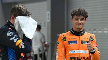 Formula One F1 - Singapore Grand Prix - Marina Bay Street Circuit, Singapore - September 21, 2024 McLaren's Lando Norris celebrates after qualifying in pole position REUTERS/Caroline Chia