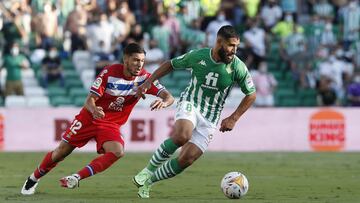 Fekir, con Óscar Gil.