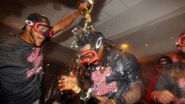 Sep 28, 2016; Bronx, NY, USA; Boston Red Sox first baseman Hanley Ramirez (13) is doused with champagne by a teammate after losing to the New York Yankees at Yankee Stadium but clinching their division with a Toronto Blue Jays loss. Mandatory Credit: Brad Penner-USA TODAY Sports     TPX IMAGES OF THE DAY     