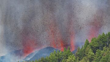 Lava and smoke rise following the eruption of a volcano in the Cumbre Vieja national park at El Paso, on the Canary Island of La Palma, September 19, 2021. 