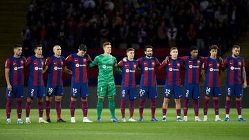 Barcelona's players line up before the start of the Spanish league football match between FC Barcelona and Athletic Club Bilbao at the Estadi Olimpic Lluis Companys in Barcelona on October 22, 2023. (Photo by Josep LAGO / AFP)