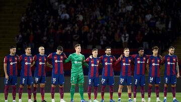 Barcelona's players line up before the start of the Spanish league football match between FC Barcelona and Athletic Club Bilbao at the Estadi Olimpic Lluis Companys in Barcelona on October 22, 2023. (Photo by Josep LAGO / AFP)