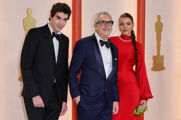 HOLLYWOOD, CA - MARCH 12: Olmo Cuarón, Alfonso Cuarón and Bu Cuarón attend the 95th Academy Awards at the Dolby Theatre on March 12, 2023 in Hollywood, California. (Allen J. Schaben / Los Angeles Times via Getty Images)