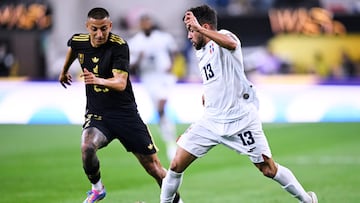 Roberto Alvarado (L) of Mexico fights for the ball with Edison Azcona (R) of Dominican during the match Mexico National (Mexico) and Dominican Republic as part to 2025 Concacaf Gold Cup Group A, at SoFi Stadium, on June 14, 2025 on Inglewood, Los Angeles California, United States.