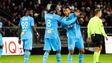 Luis Suárez y Gerson celebrando un gol con Olympique Marsella por Ligue 1.