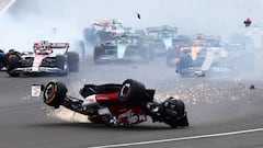 NORTHAMPTON, ENGLAND - JULY 03: Zhou Guanyu of China driving the (24) Alfa Romeo F1 C42 Ferrari crashes at the start during the F1 Grand Prix of Great Britain at Silverstone on July 03, 2022 in Northampton, England. (Photo by Mark Thompson/Getty Images)