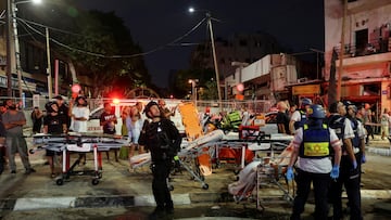 Emergency personnel operate after missiles were launched from Iran to Israel, in Tel Aviv, Israel, June 16, 2025. REUTERS/Ronen Zvulun TPX IMAGES OF THE DAY