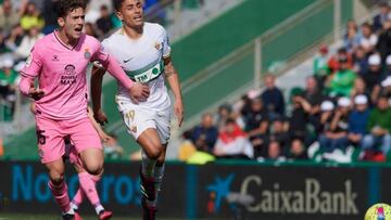 ELCHE, SPAIN - FEBRUARY 19: Ezequiel Ponce of Elche CF competes for the ball with Jose Gragera of RCD Espanyol during the LaLiga Santander match between Elche CF and RCD Espanyol at Estadio Manuel Martinez Valero on February 19, 2023 in Elche, Spain. (Photo by Francisco Macia/Quality Sport Images/Getty Images)