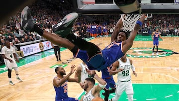 OG Anunoby #8 of the New York Knicks dunks the ball against Jayson Tatum #0 of the Boston Celtics in Game One of the Eastern Conference Second Round NBA Playoffs at TD Garden on May 05, 2025 in Boston, Massachusetts.