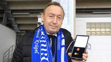 17/04/2021 FILED - 17 April 2021, Saxony-Anhalt, Magdeburg: Former FCM player and GDR  East Germany&#039;s record international Joachim Streich stands with a certificate in front of his honorary plaque &quot;Mile of Legends&quot; in front of the MDCC Aren