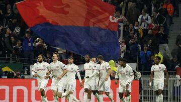Lyon&#039;s Joachim Andersen, second left, celebrates his opening goal with teammates during the group G Champions League soccer match between Lyon and Benfica at the Lyon Olympic Stadium in Decines, outside Lyon, France, Tuesday, Nov. 5, 2019. (AP Photo/
