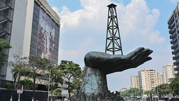 View of the &quot;Peace Monument&quot; sculpture outside the headquarters of Venezuelan state-owned oil company PDVSA, in Caracas, on April 22, 2020. - The OPEC alliance of oil producers said &quot;several&quot; member states, and some of its allies in th