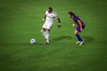 Edwin Congo y Carles Puyol.