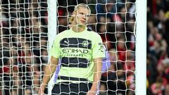 Manchester City's Norwegian striker Erling Haaland reacts during the English Premier League football match between Liverpool and Manchester City at Anfield in Liverpool, north west England on October 16, 2022. (Photo by Oli SCARFF / AFP) / RESTRICTED TO EDITORIAL USE. No use with unauthorized audio, video, data, fixture lists, club/league logos or 'live' services. Online in-match use limited to 120 images. An additional 40 images may be used in extra time. No video emulation. Social media in-match use limited to 120 images. An additional 40 images may be used in extra time. No use in betting publications, games or single club/league/player publications. / 