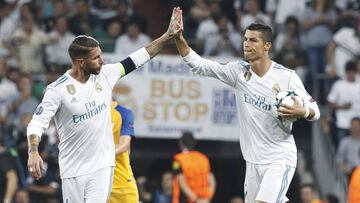 Cristiano y Ramos celebran sus goles.