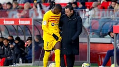Xavi, con Dembélé el día de su lesión en Girona.
