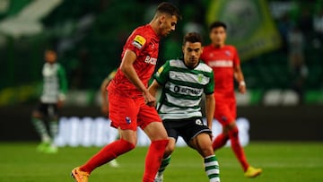 LISBON, PORTUGAL - SEPTEMBER 30: Lucas Cunha of Gil Vicente FC with Pedro Goncalves of Sporting CP in action during the Liga Bwin match between Sporting CP and Gil Vicente at Estadio Jose Alvalade on September 30, 2022 in Lisbon, Portugal.  (Photo by Gualter Fatia/Getty Images)