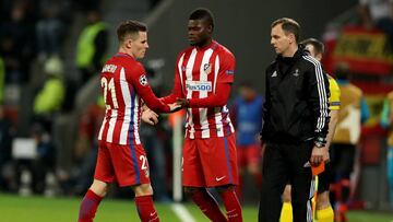 LEVERKUSEN, GERMANY - FEBRUARY 21: Thomas Partey (R) of Atletico replaces Kevin Gameiro during the UEFA Champions League Round of 16 first leg match between Bayer Leverkusen and Club Atletico de Madrid at BayArena on February 21, 2017 in Leverkusen, Germany. (Photo by Maja Hitij/Bongarts/Getty Images)