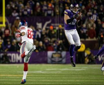 La intercepción de Minnesota, Harrison Smith, realizando la intercepción que marca el momento del partido en que Vikings se fue en el marcador.