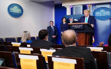 Administrator of the Centers for Medicare and Medicaid Services Seema Verma listen as US President Donald Trump speaks during the daily briefing on the novel coronavirus.