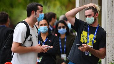 Tennis players and officials wait in line to receive covid19 tests at the View Hotel in Melbourne, Thursday, February 4, 2021. Australian Open preparations are on hold after a hotel worker's positive coronavirus case put health authorities on alert. (AAP