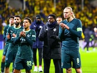 Soccer Football - UEFA Champions League - Bodo/Glimt v Manchester City - Aspmyra Stadion, Bodo, Norway - January 20, 2026 Manchester City's Erling Haaland and Rico Lewis applaud fans after the match Fredrik Varfjell/NTB via REUTERS ATTENTION EDITORS - THIS IMAGE WAS PROVIDED BY A THIRD PARTY. NORWAY OUT. NO COMMERCIAL OR EDITORIAL SALES IN NORWAY.