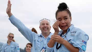 Australian Medical Assistance Team (AUSMAT) staff who worked with the passengers and crew on the cruise ship MV Artania wave goodbye as it departs Fremantle Fremantle harbour, in Fremantle.