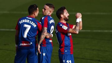 Soccer Football - La Liga Santander - Real Madrid v Levante - Estadio Alfredo Di Stefano, Madrid, Spain - January 30, 2021 Levante's Roger Marti celebrates with Jose Luis Morales and teammates REUTERS/Javier Barbancho