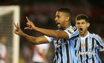 Soccer Football - Copa Libertadores - Argentina's River Plate v Brazil's Gremio Semi Final First Leg - Antonio Vespucio Liberti stadium, Buenos Aires, Argentina - October 23, 2018. Gremio's Michel celebrates with team mates scoring their first goal.