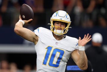 ARLINGTON, TX - AUGUST 24: Justin Herbert #10 of the Los Angeles Chargers warms up before a preseason game between the Dallas Cowboys and the Los Angeles Chargers at AT&T Stadium on August 24, 2024 in Arlington, Texas.   Ron Jenkins/Getty Images/AFP (Photo by Ron Jenkins / GETTY IMAGES NORTH AMERICA / Getty Images via AFP)