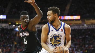 Jan 4, 2018; Houston, TX, USA; Golden State Warriors guard Stephen Curry (30) dribbles the ball as Houston Rockets center Clint Capela (15) defends during the third quarter at Toyota Center. Mandatory Credit: Troy Taormina-USA TODAY Sports