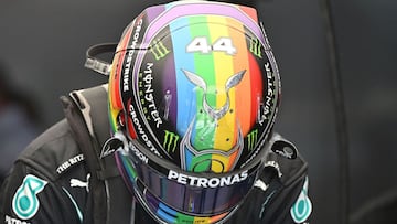 Mercedes&#039; British driver Lewis Hamilton steps out of his car during the first practice session ahead of the Qatari Formula One Grand Prix at the Losail International Circuit, in the city of Lusail, on November 19, 2021. (Photo by ANDREJ ISAKOVIC / AF