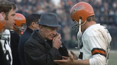 UNSPECIFIED - CIRCA 1969:  Head Coach Paul Brown of the Cincinnati Bengals talks with his quarterback Greg Cook #12 on the sidelines during an AFL Football game circa 1969.  Brown coached the Bengals from 1968-75. (Photo by Focus on Sport/Getty Images) 