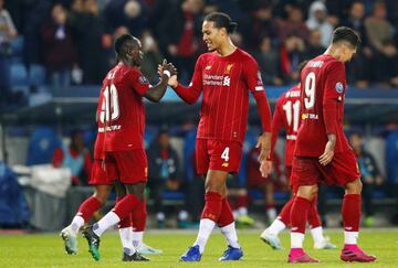 Liverpool's Sadio Mane celebrates scoring their third goal with teammate Virgil van Dijk