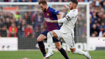 FILE PHOTO: Soccer Football - La Liga Santander - FC Barcelona v Real Madrid - Camp Nou, Barcelona, Spain - October 28, 2018 Barcelona's Ivan Rakitic in action with Real Madrid's Sergio Ramos REUTERS/Albert Gea/File Photo