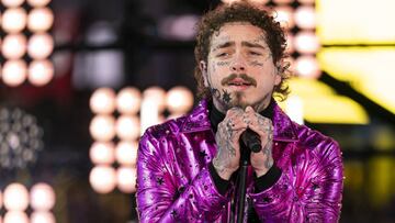 ARCHIVO - Esta fotograf&iacute;a de archivo del martes 31 de diciembre de 2019 muestra a Post Malone actuando en la celebraci&oacute;n de la v&iacute;spera de A&ntilde;o Nuevo en Times Square en Nueva York.