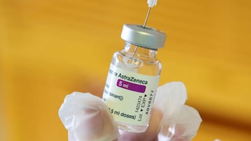 A medical worker holds a vial of AstraZeneca COVID-19 vaccine at a vaccination centre in Ronquieres, Belgium April 6, 2021. 