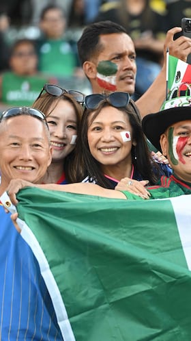 Face-painted fans arrive for the MexTour international friendly football match between Mexico and Japan at the Oakland-Alameda County Coliseum in Oakland, California, on September 6, 2025. (Photo by Karl Mondon / AFP)